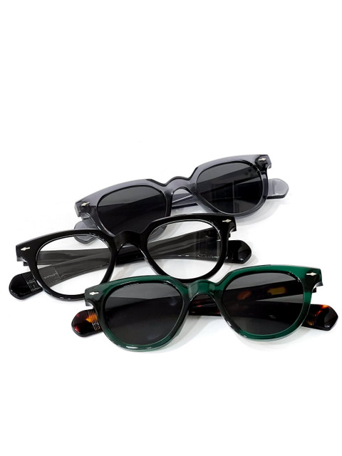 Keyhole sunglasses in grey, black and green.