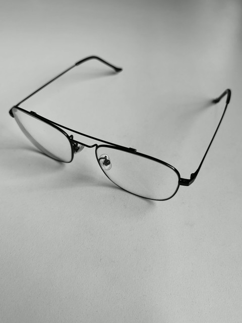 Black wire aviator frames on white.